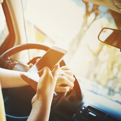 Texting and Driving Stock Photo