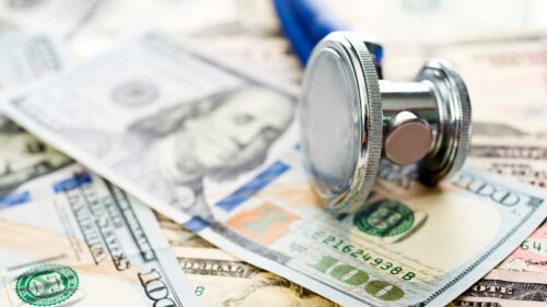 Stethoscope Dollar Bills Stock Photo