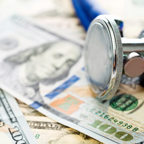 Stethoscope Dollar Bills Stock Photo