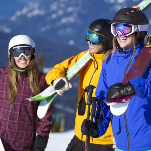 Skiers and Snowboarders Stock Photo