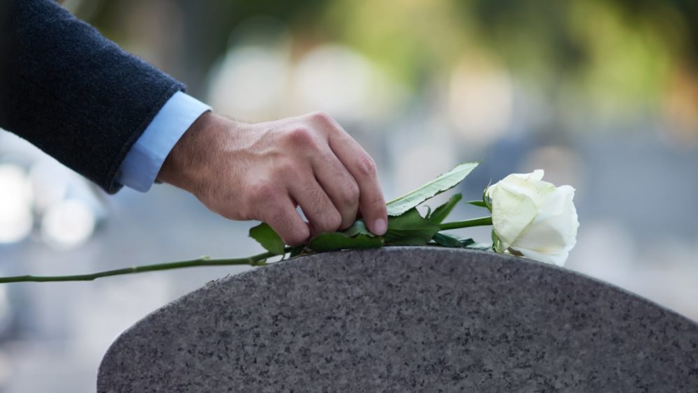White Rose Gravestone Stock Photo
